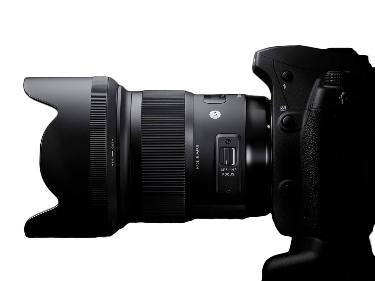 Sigma 50mm f/1.4 DG HSM Art Lens for Canon with LaCie Hard Drive and SanDisk 64GB Memory Card